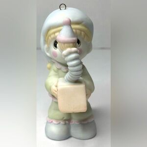 Precious Moments little boy with jack in the box touching noses